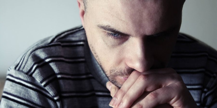 Man thinking of a depression treatment centers in ohio